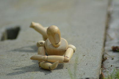 Close-up of stuffed toy on wood