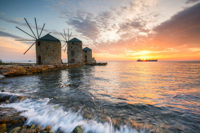 Sunrise image of the iconic windmills in chios town.
