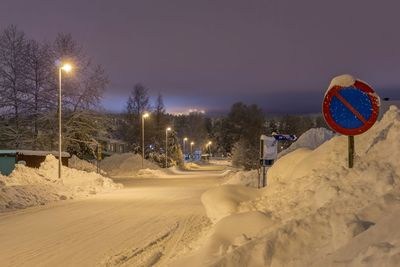 Illuminated street light at night