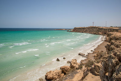 Scenic view of sea against clear sky