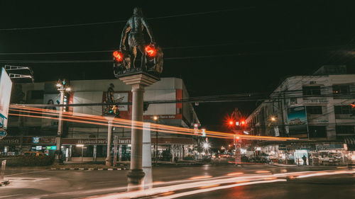 Blurred motion of cars on city street at night