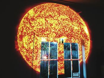 Close-up of illuminated street light