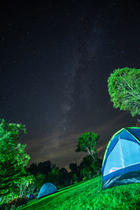 Tent against sky at night