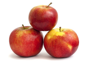 Close-up of apple against white background