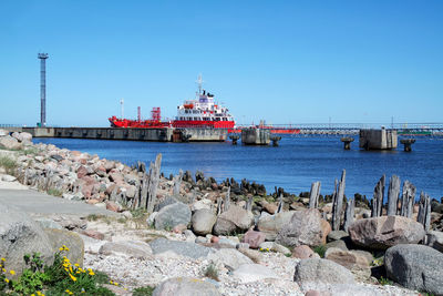 Scenic view of sea against clear blue sky