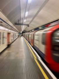 Blurred motion of train at subway station