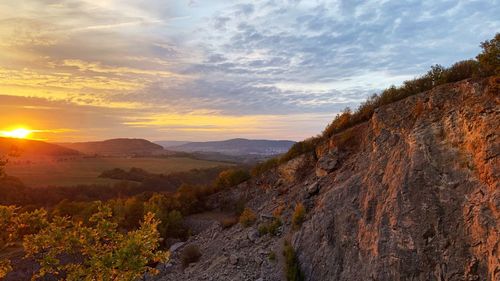 Scenic view of mountains against sky during sunset