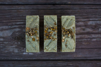 Close-up of protein bars on wooden table