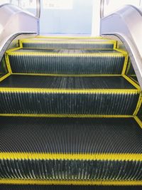 High angle view of yellow escalator