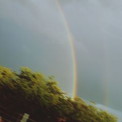 Scenic view of rainbow against sky