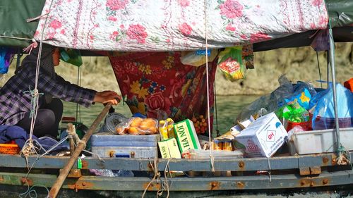 Multi colored umbrellas for sale at market stall