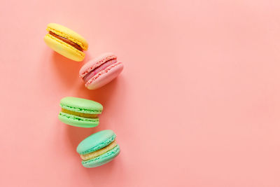 Close-up of candies against colored background