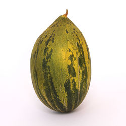 Close-up of fruit against white background