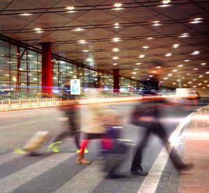 Blurred motion of illuminated lights in city