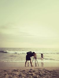 People walking on beach