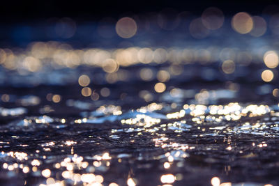 Defocused image of illuminated city at night