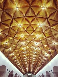 Low angle view of illuminated ceiling