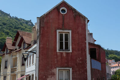 Low angle view of old building against clear sky