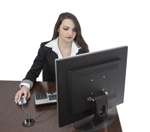 Portrait of woman working on table