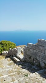 Scenic view of sea against blue sky