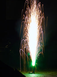 Firework display at night