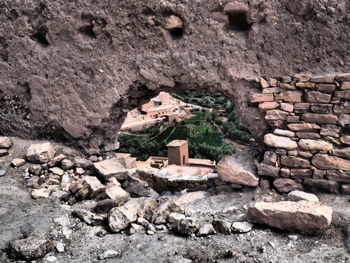 High angle view of buildings seen through hole