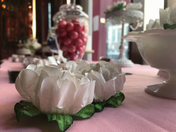 Close-up of roses on table