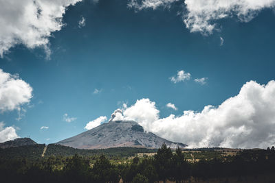 Panoramic view of volcanic landscape against sky