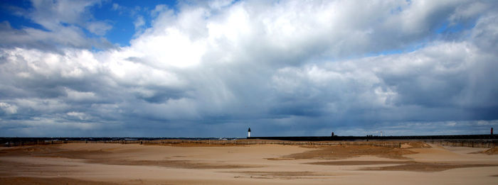 Panoramic view of beach against sky