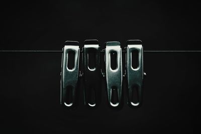 Close-up of keys over black background