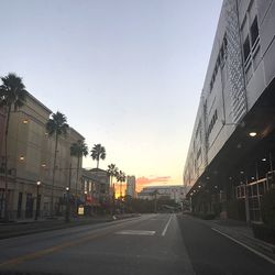 Road in city against sky