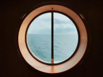 Sea seen through window of boat