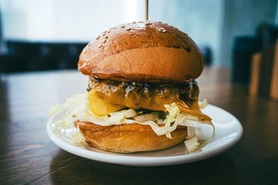 Close-up of burger in plate on table