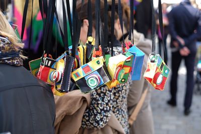 People shopping at market stall