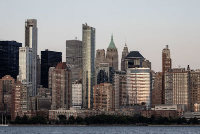 Modern buildings in city against sky