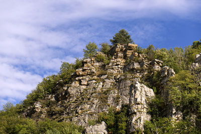 A hill in a crag in piedmont, also a rock climbing gym