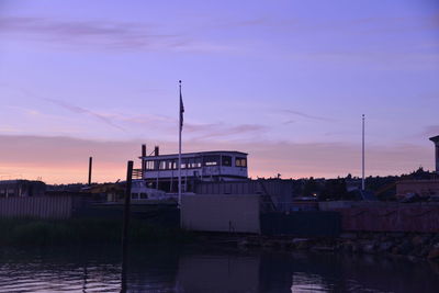 View of harbor at sunset