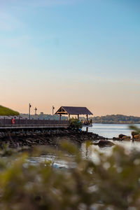 Scenic view of sea against sky at sunset