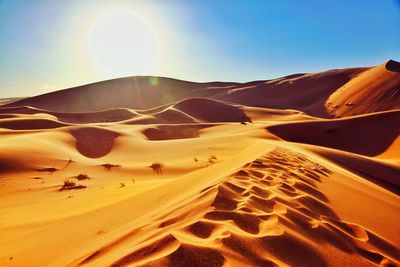 Scenic view of desert against sky