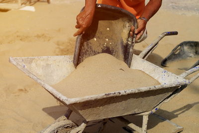 Midsection of man preparing food