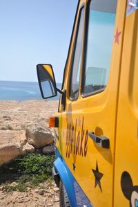 View of yellow car on land