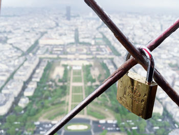 Close-up of padlocks on railing