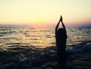 Scenic view of sea at sunset