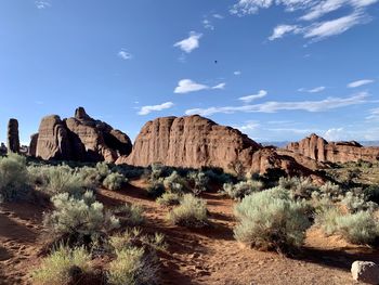 Panoramic view of rock formations against sky