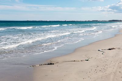 Scenic view of beach against sky