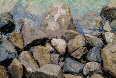 Full frame shot of rocks on shore