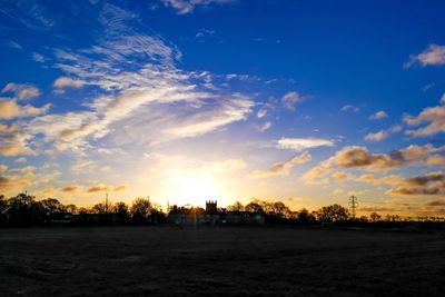 Scenic view of landscape at sunset