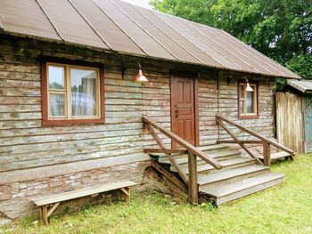 Exterior of house on field against building