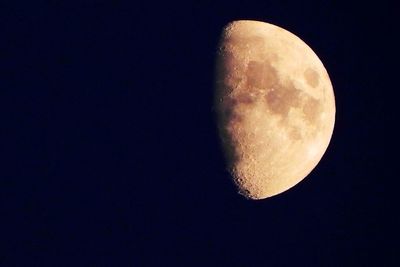 Low angle view of moon in sky