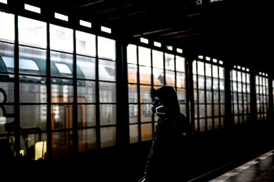 Man wearing mask at railway station